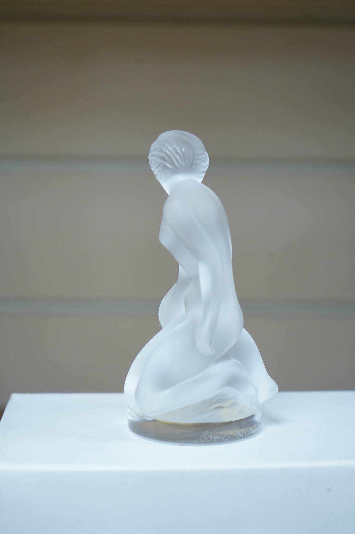 A Lalique frosted glass figurine of Leda and the Swan, signed to the base, boxed, 11.5cm high